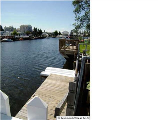 29 Brig, Mystic Island - Single Family - Rancher on the Lagoon with deck over the water with a boat slip. Home was remodeled after STORM sandy new kitchen cabinets new bathroom was sprayed for anti fungus  foamed with closed cell foam     4 feet around the base of the interior was replaced with dura-rock all new doors and trim  house like new